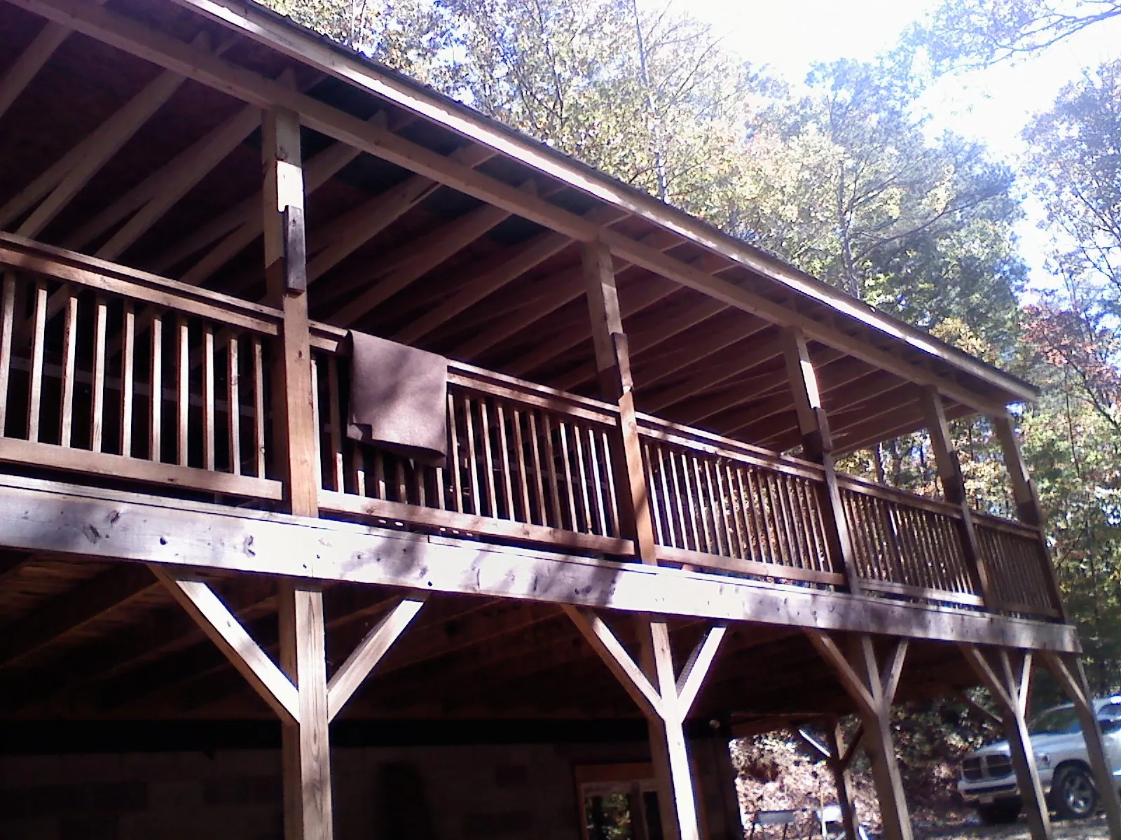 Timber framing under a new elevated porch and deck — Roof Leak Repair in Gravity by Roofing Brothers